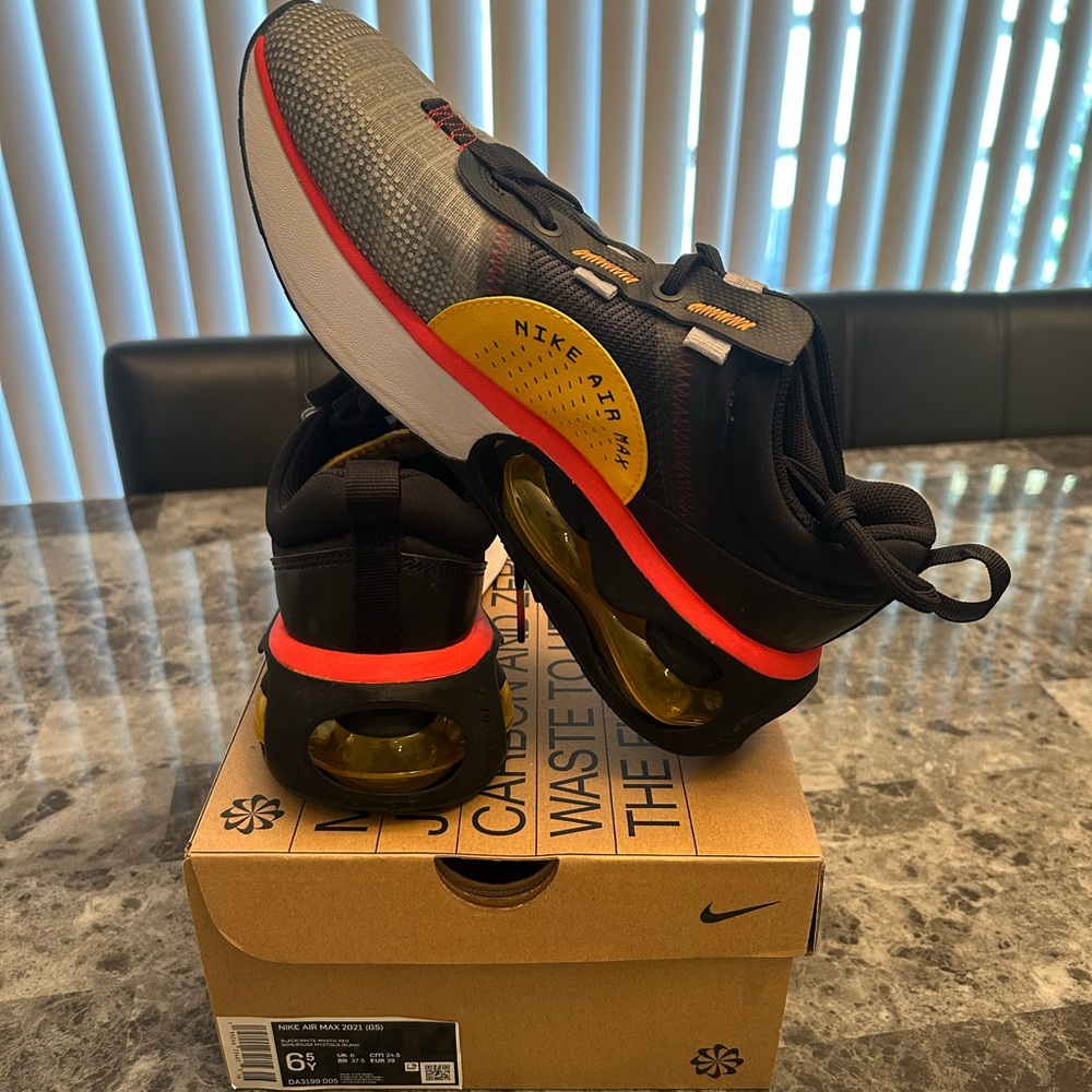 Nike Air Max Black and Gold Sneakers (Big Kids)